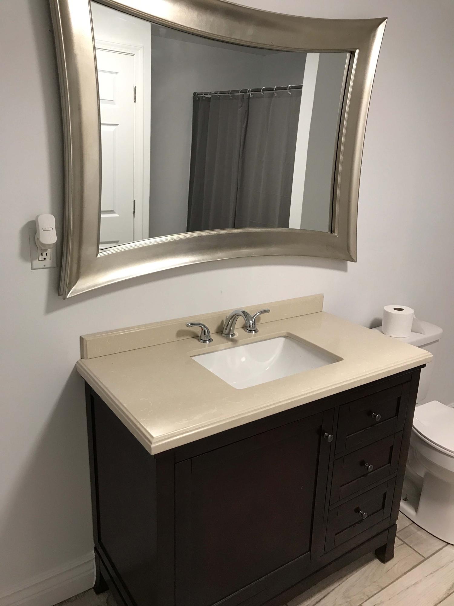 75 Cobblestone Drive Blue Ridge, VA 24064 - Photo 40 of 60 a bathroom with a sink and a mirror
