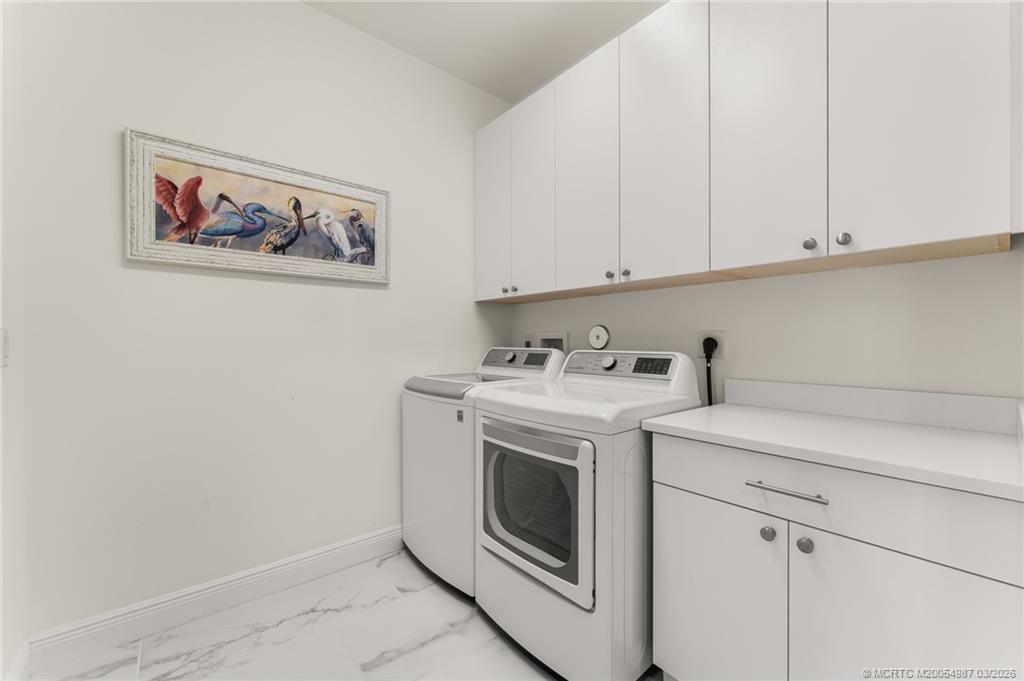 517 Southwest Ocean Boulevard Stuart, FL 34994 - Photo 33 of 45 2nd floor laundry room