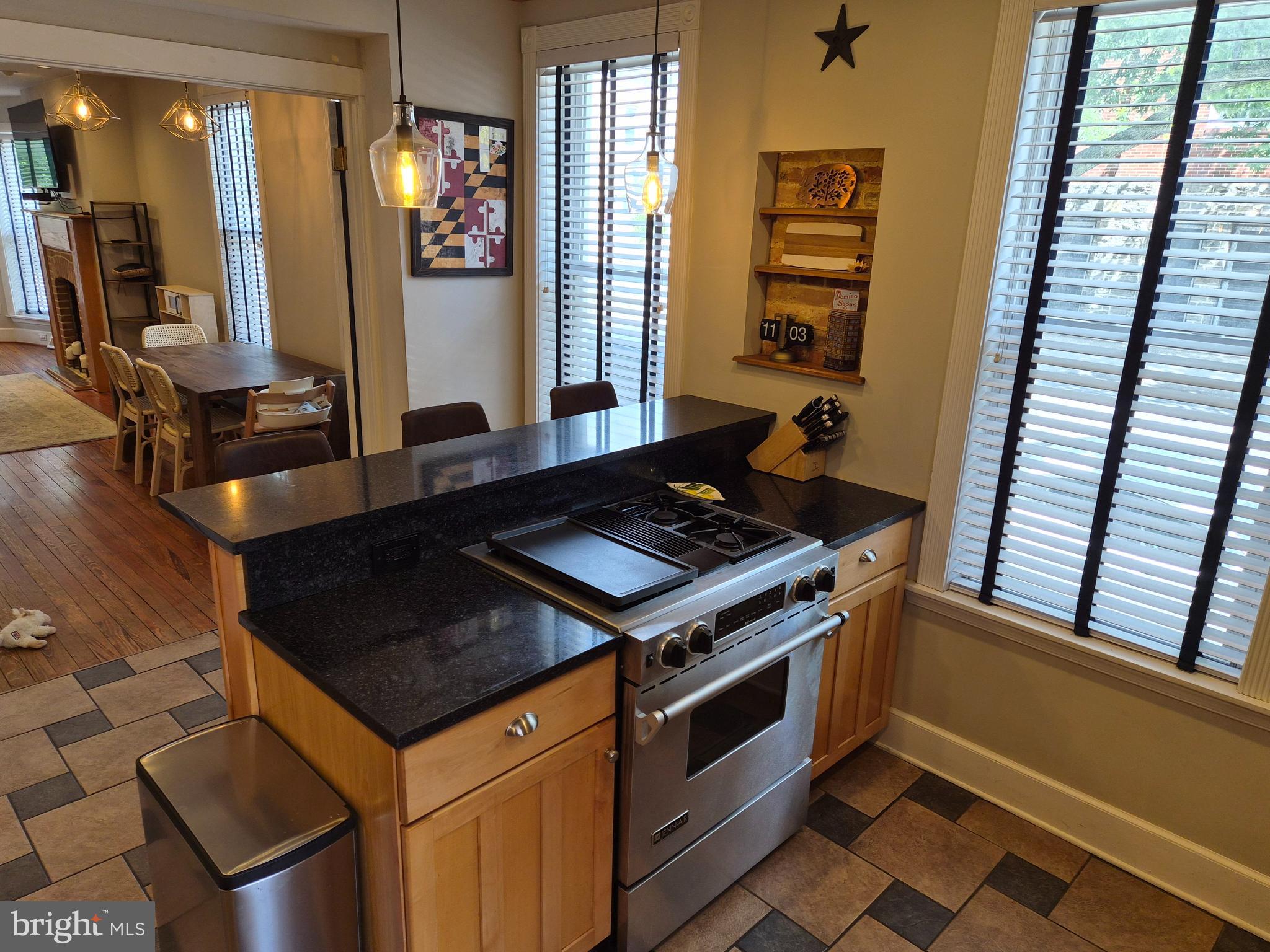 1601 Belt Street Baltimore, MD 21230 - Photo 10 of 30 a kitchen with a stove and a mirror