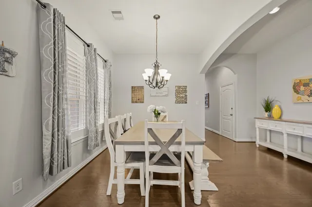 a view of living room with furniture and flat screen tv