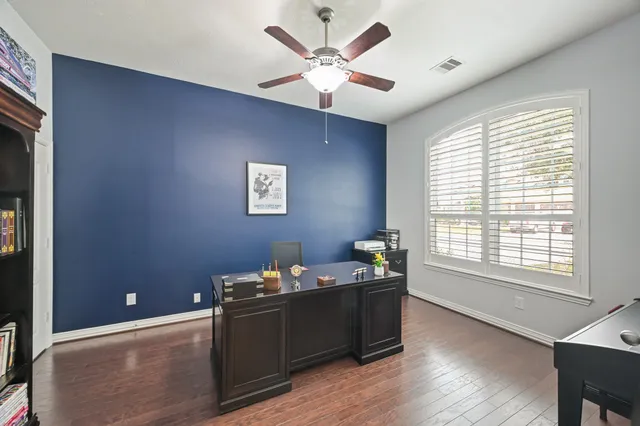 a view of a workspace with furniture