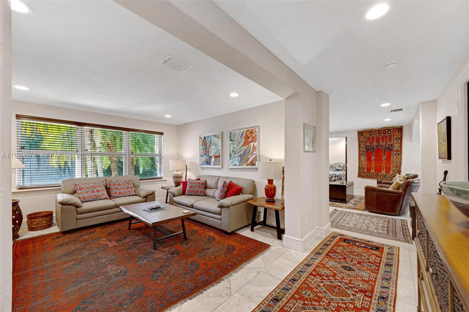 205 South Harbor Drive Key Largo, FL 33037 - Photo 13 of 50 a living room with furniture and a rug