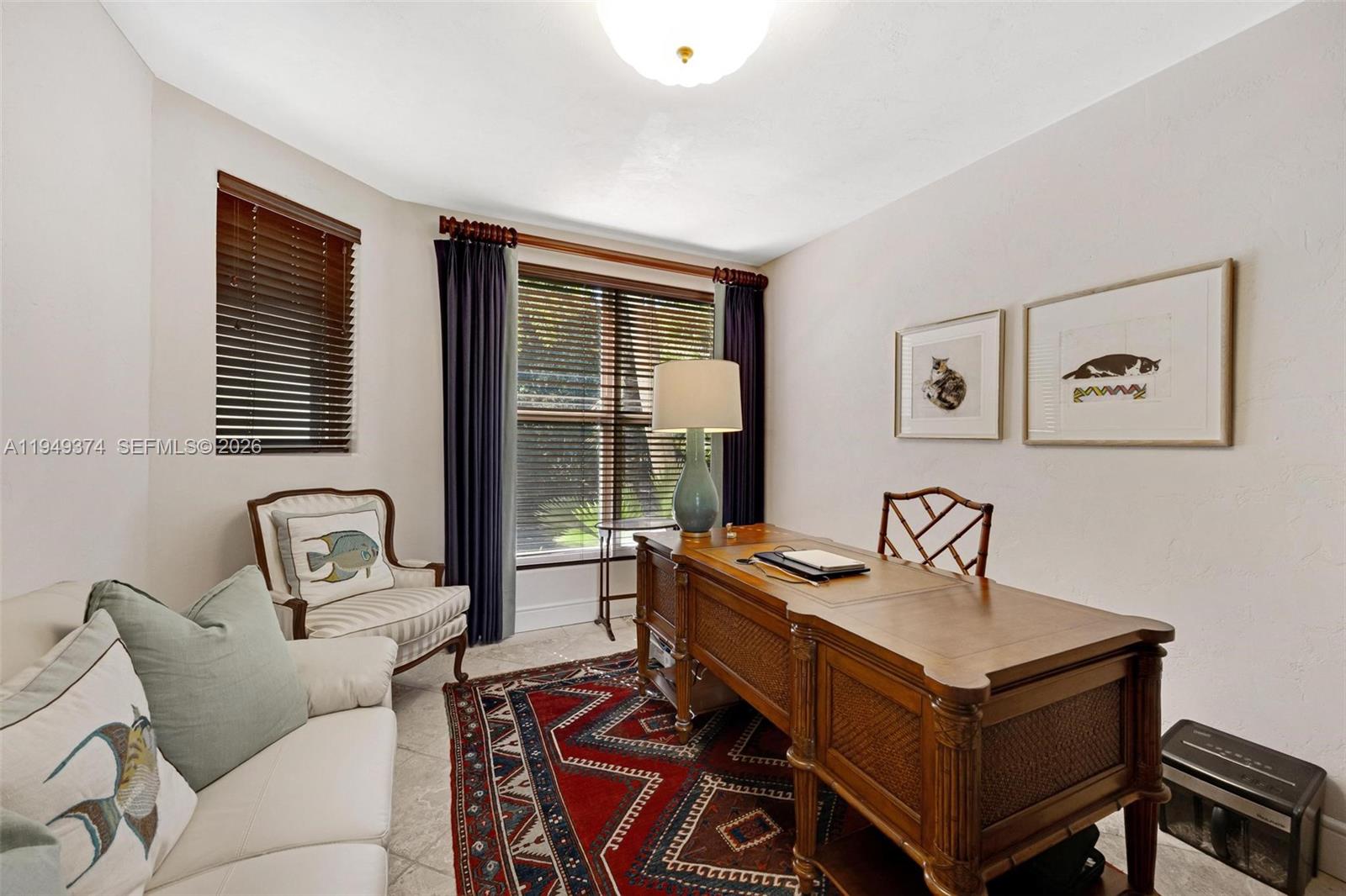 205 South Harbor Drive Key Largo, FL 33037 - Photo 22 of 50 a living room with furniture and large windows