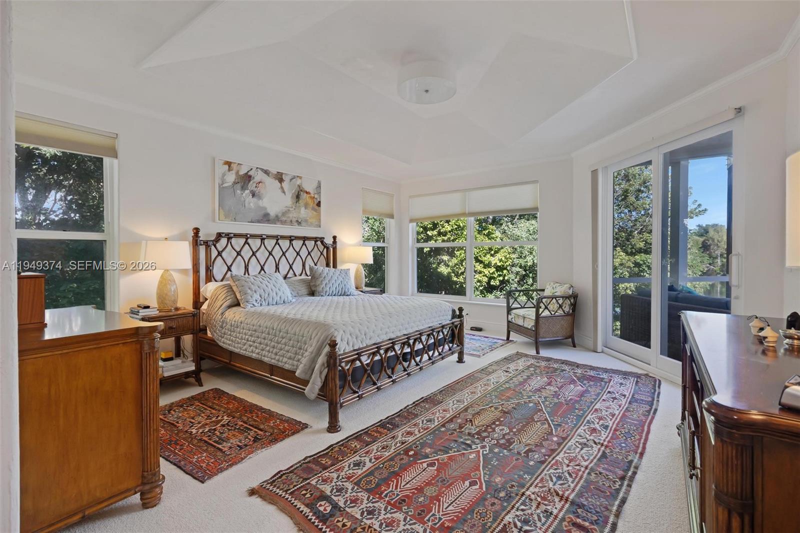 205 South Harbor Drive Key Largo, FL 33037 - Photo 24 of 50 a bed sitting in a bedroom next to a window