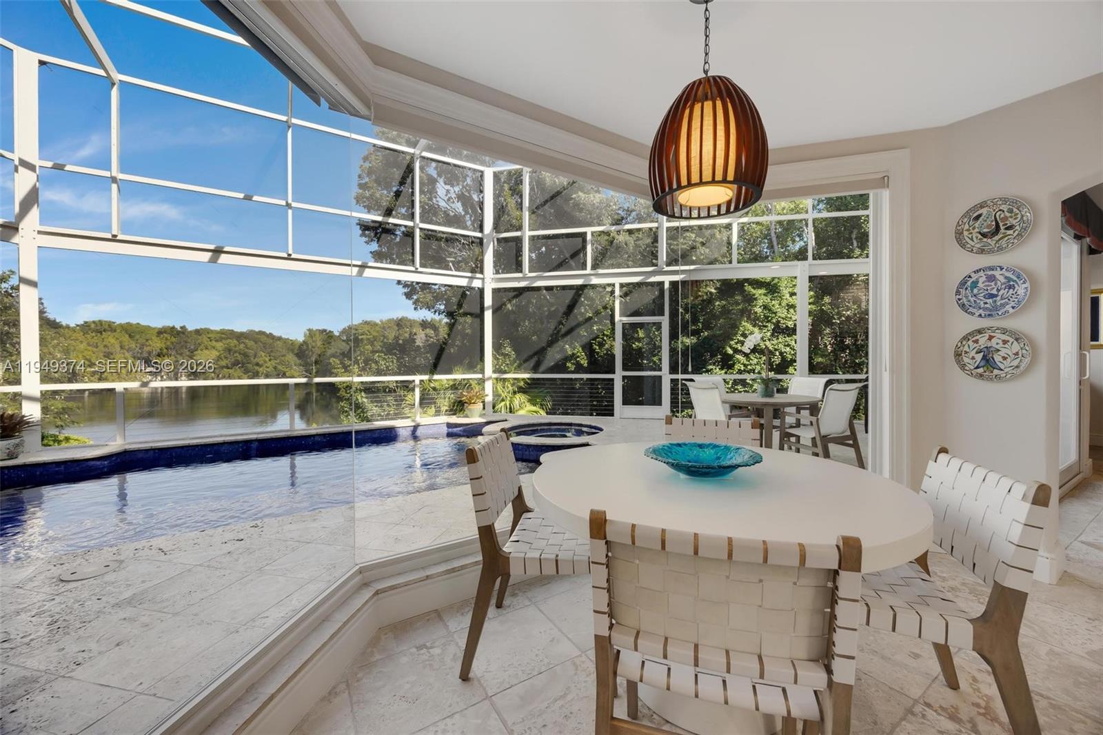 205 South Harbor Drive Key Largo, FL 33037 - Photo 32 of 50 a view of a dining room with furniture window and wooden floor