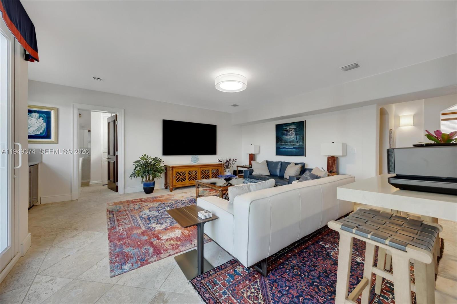 205 South Harbor Drive Key Largo, FL 33037 - Photo 34 of 50 a living room with furniture and a flat screen tv