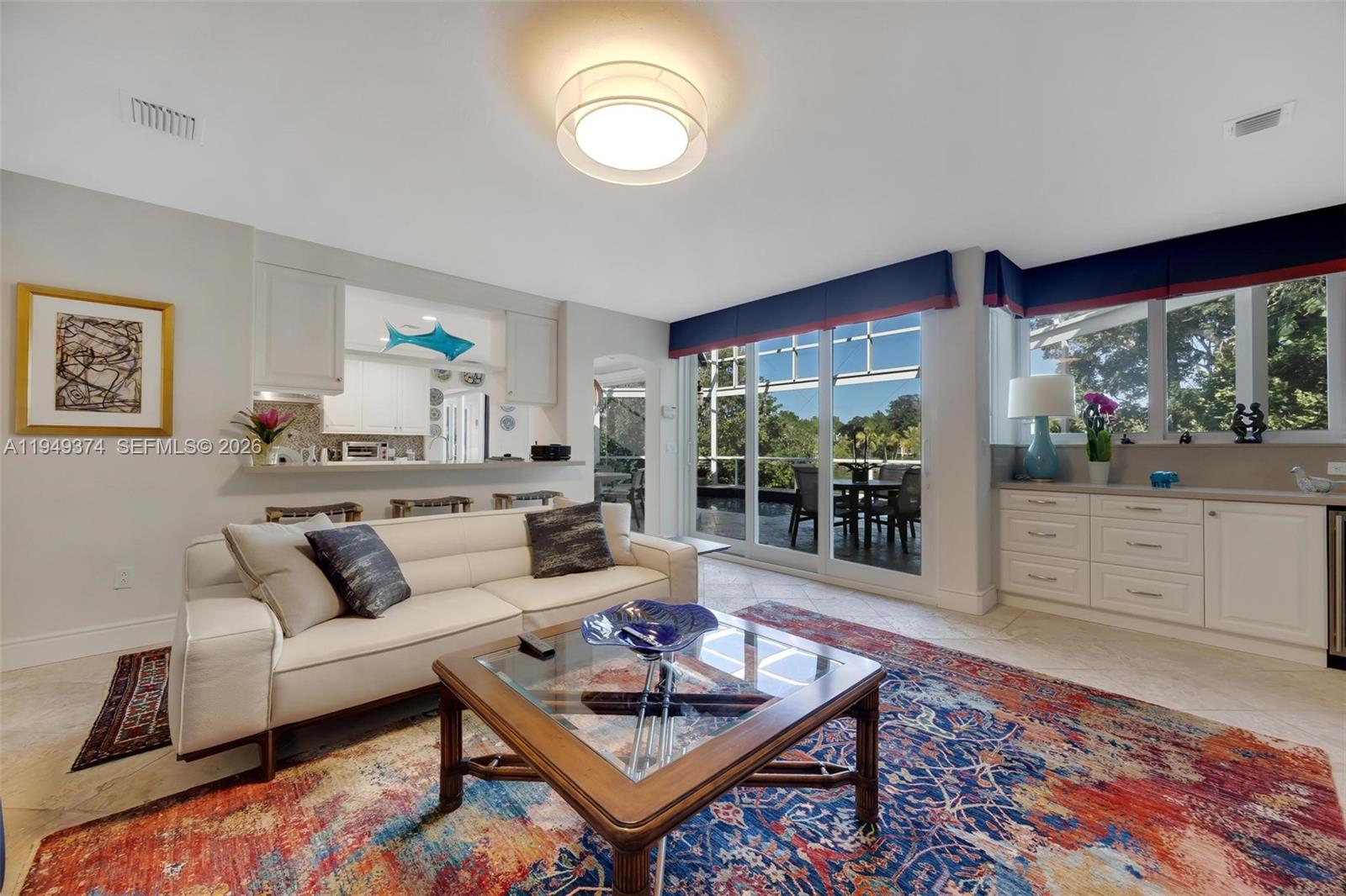 205 South Harbor Drive Key Largo, FL 33037 - Photo 36 of 50 a living room with furniture and a large window