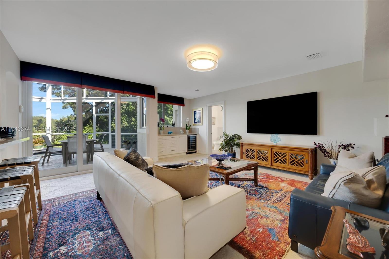 205 South Harbor Drive Key Largo, FL 33037 - Photo 37 of 50 a living room with furniture and a flat screen tv