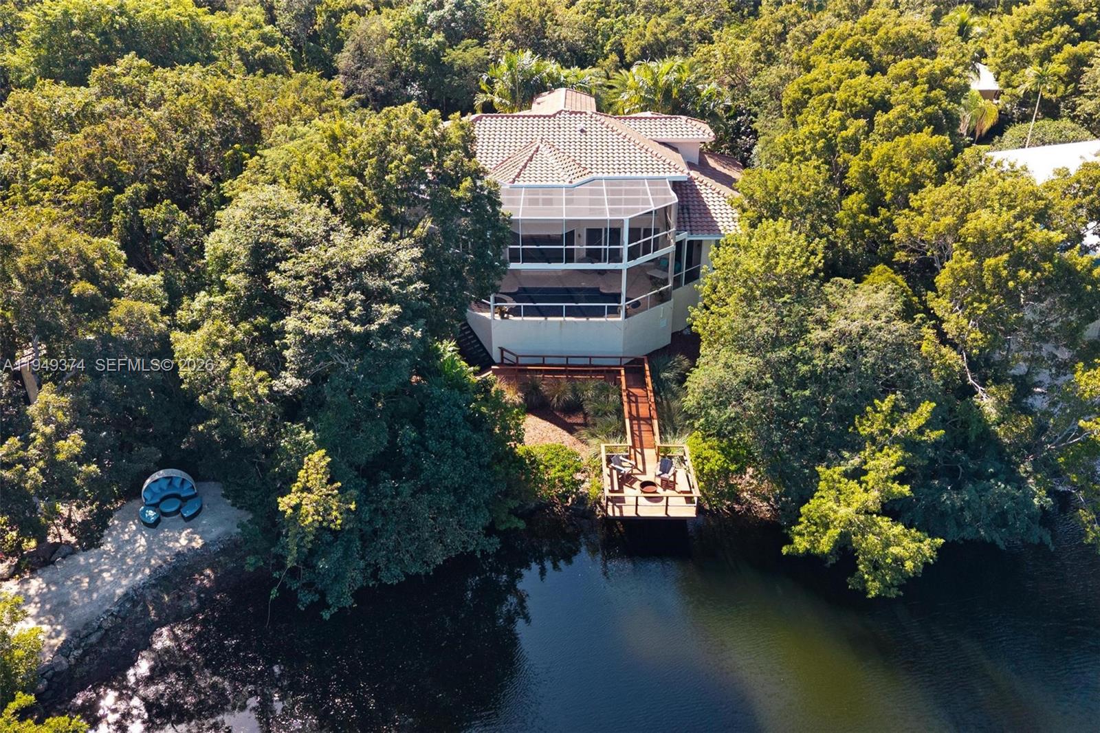 205 South Harbor Drive Key Largo, FL 33037 - Photo 44 of 50 a aerial view of a house with a yard basket ball court and outdoor seating