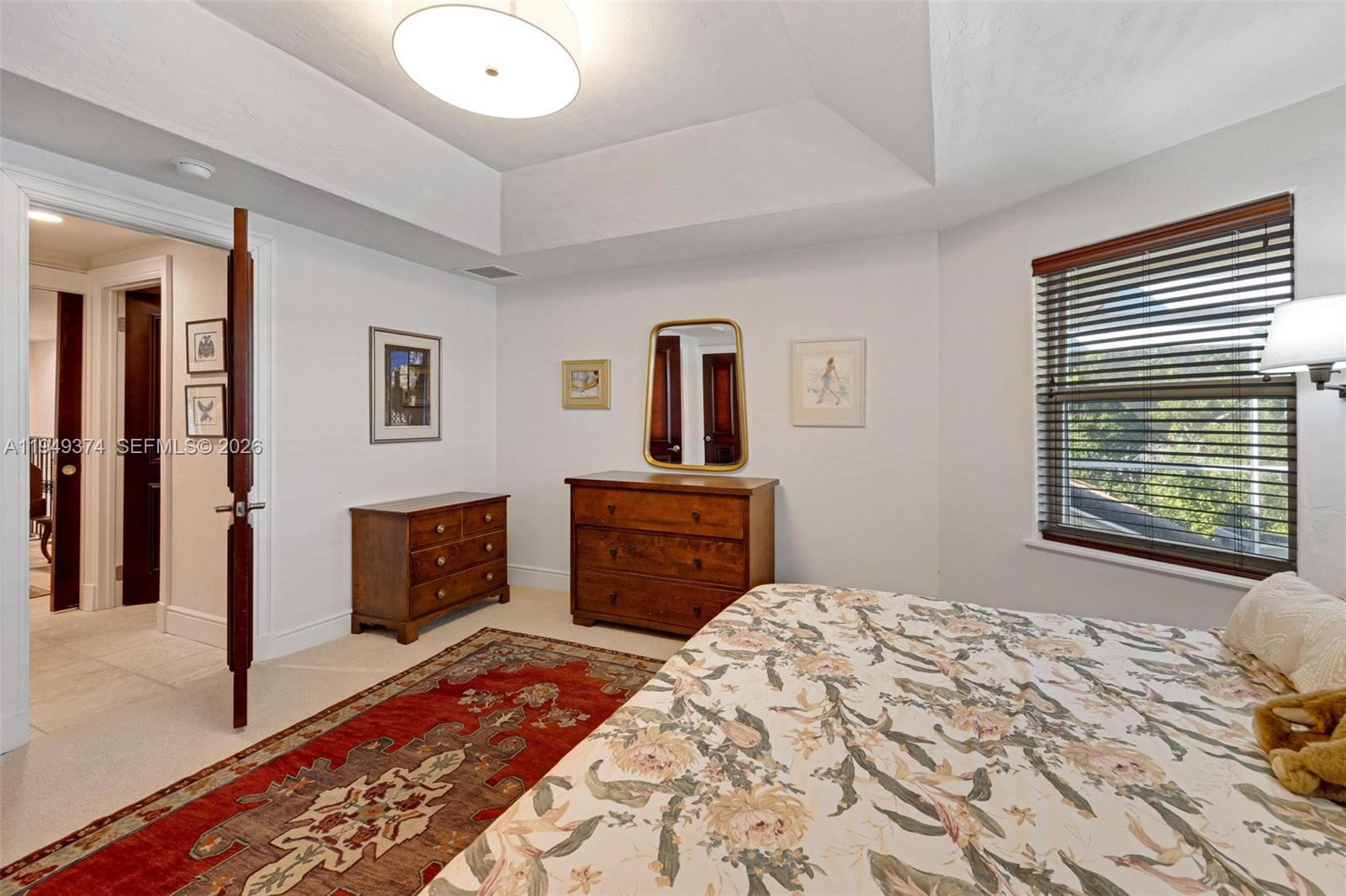 205 South Harbor Drive Key Largo, FL 33037 - Photo 7 of 50 a bedroom with a bed and a dresser