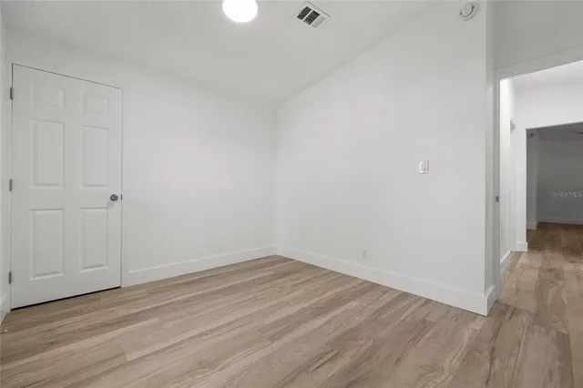 a view of small space with wooden floor