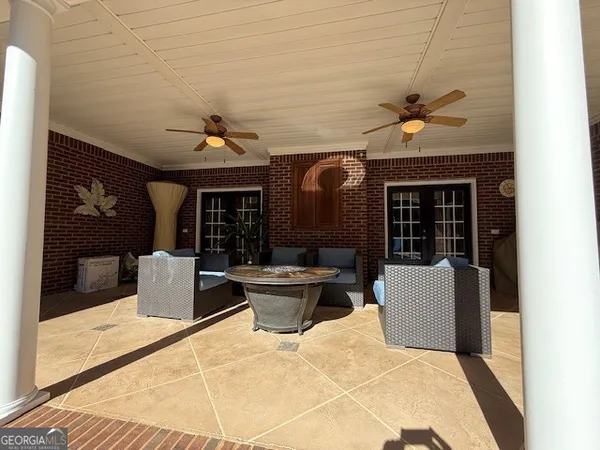 a view of a street with houses on both side of it