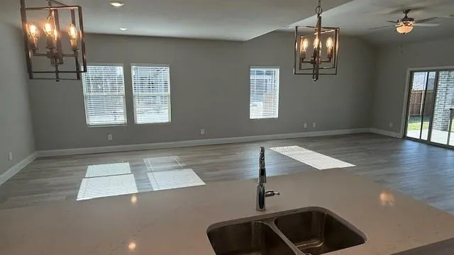 a view of entryway and hall with a front door
