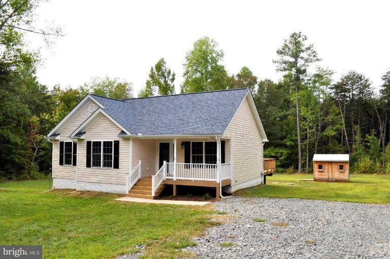 2220 Partlow Road Beaverdam, VA 23015 - Photo 24 of 24 a front view of a house with a yard