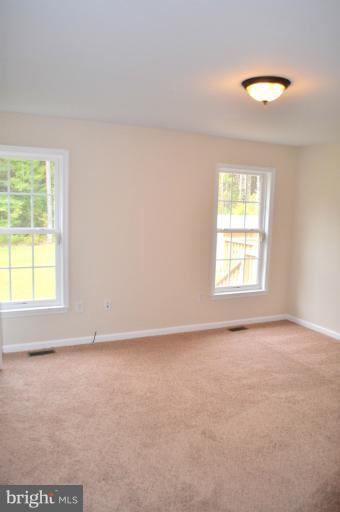 2220 Partlow Road Beaverdam, VA 23015 - Photo 7 of 24 an empty room with a window