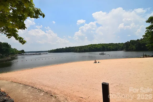 a building outdoor space with patio furniture and potted plants