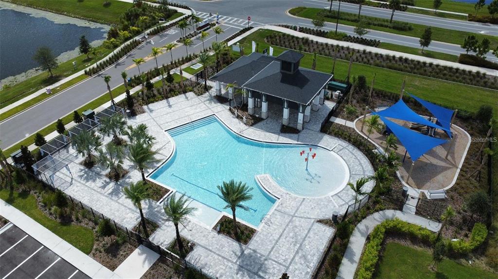 4806 Prairie Preserve Run St. Cloud, FL 34772 - Photo 2 of 13 an aerial view of a house a garden and outdoor seating