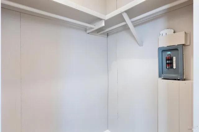 a view of empty room with floor to ceiling window