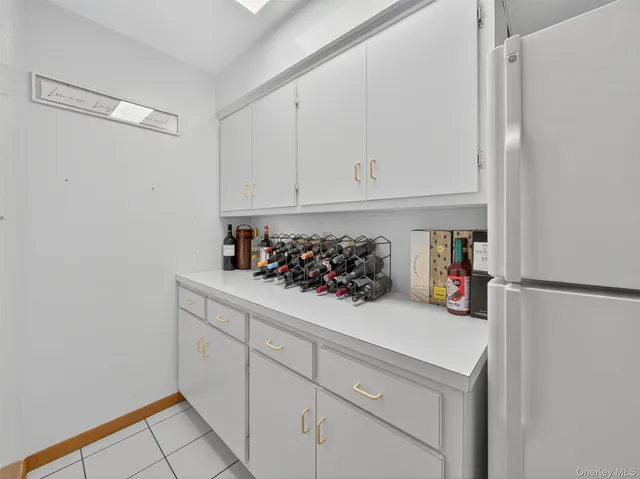 a view of a closet in kitchen