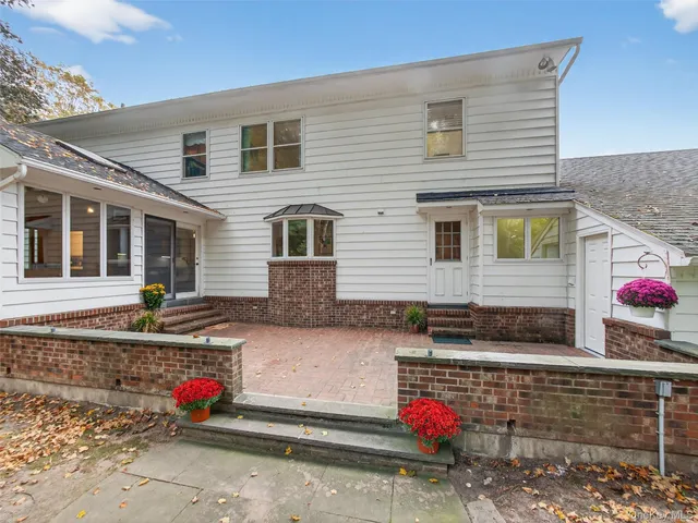 a front view of a house with street