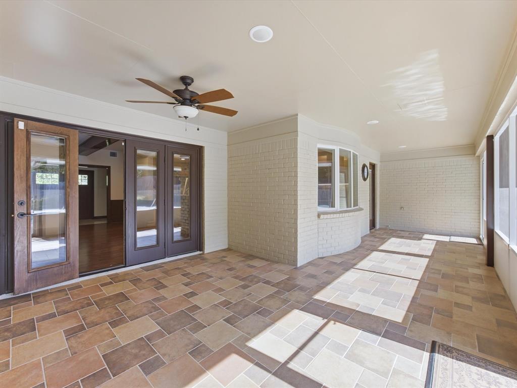 3717 Myrtle Springs Road Benbrook, TX 76116 - Photo 17 of 40 Not included in the square ft but nevertheless most enjoyable is the screened in sunroom/patio.