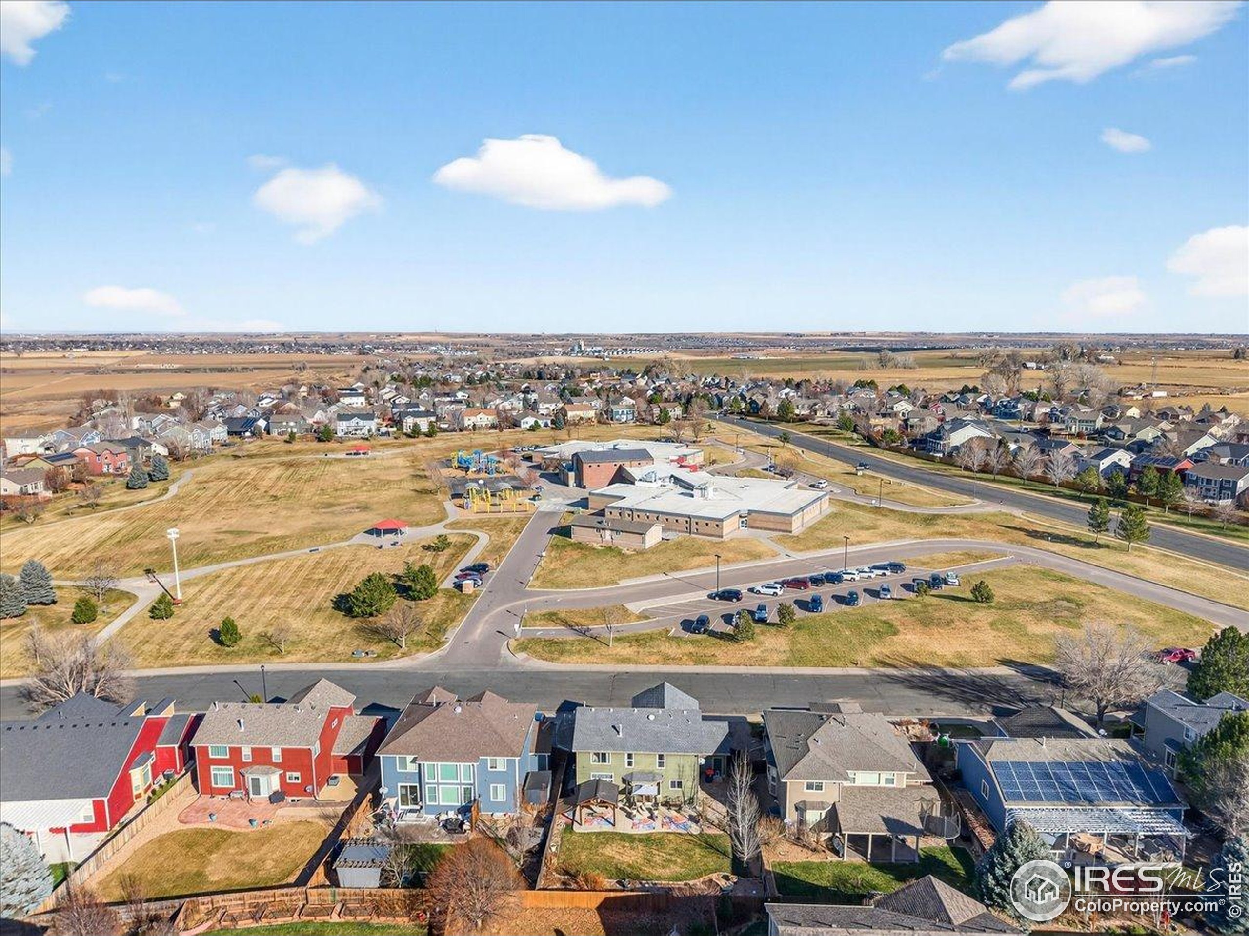 210 Saxony Road Johnstown, CO 80534 - Photo 28 of 28 an aerial view of residential building and ocean
