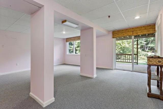 a view of livingroom with furniture and windows