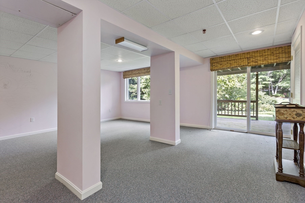 8 Chippers Lane, Unit 390 Mashpee, MA 02649 - Photo 23 of 38 a view of livingroom with furniture and windows