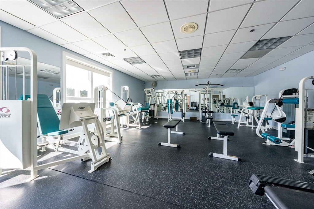 8 Chippers Lane, Unit 390 Mashpee, MA 02649 - Photo 34 of 38 a view of a room with gym equipment