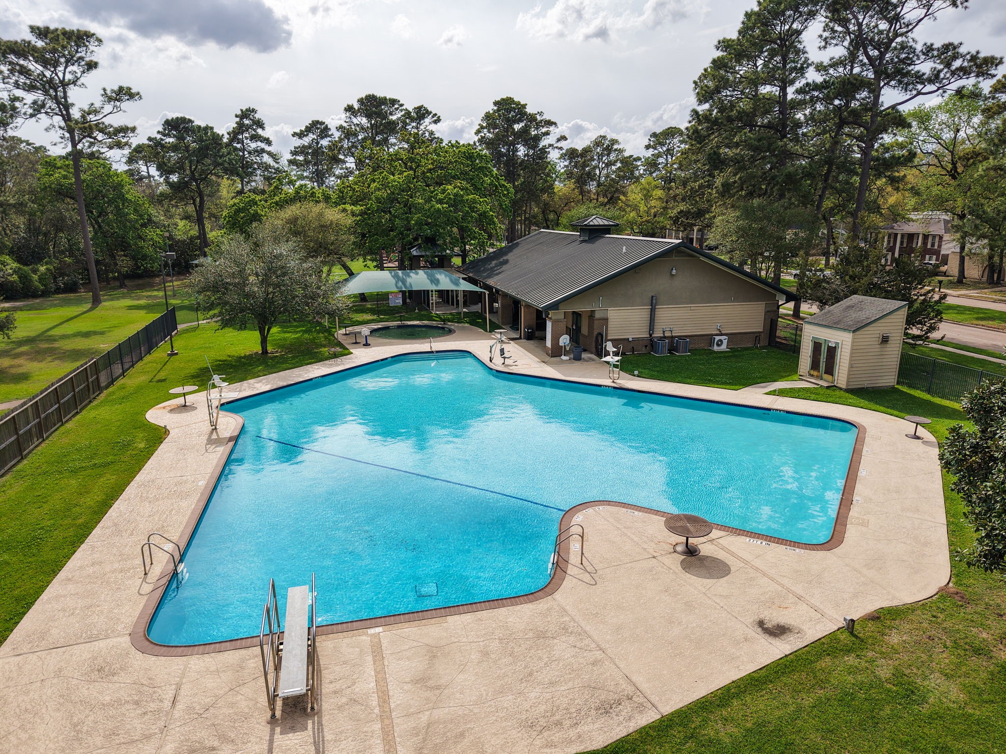 17507 Oxhill Court Spring, TX 77388 - Photo 40 of 44 This pool has a diving board, and the baby pool is shaded.