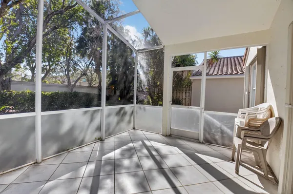 an aerial view of a house with a lake view