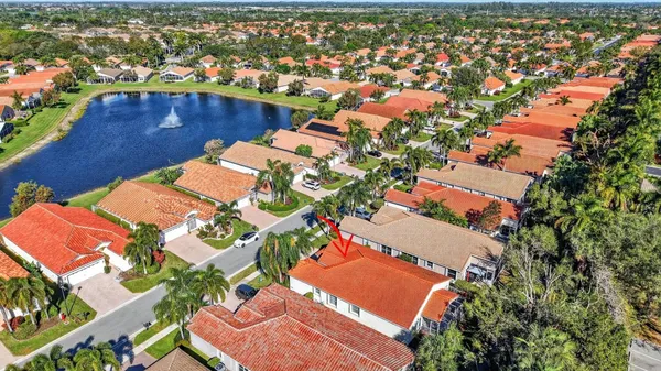 a view of a swimming pool with sitting area