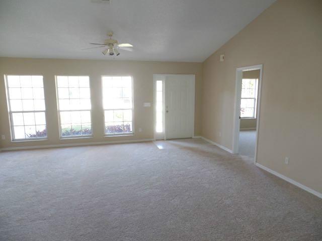 1234 Southwest Chase Road Port St. Lucie, FL 34953 - Photo 12 of 20 a view of an empty room with a window