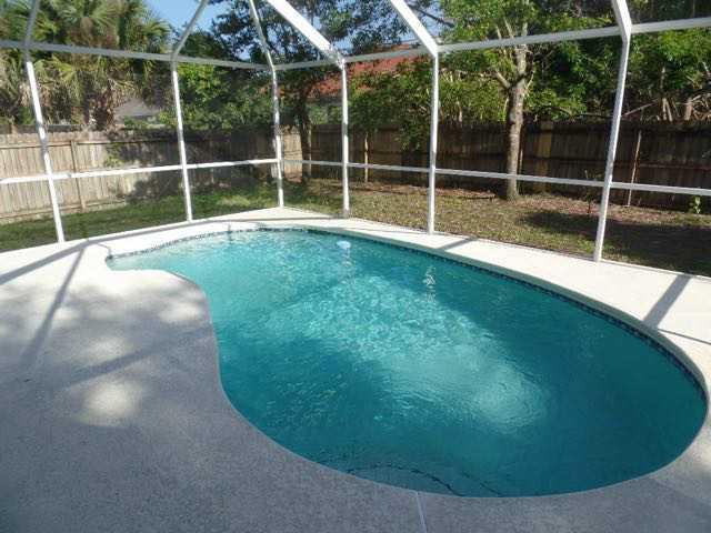 1234 Southwest Chase Road Port St. Lucie, FL 34953 - Photo 16 of 20 a view of outdoor space and yard