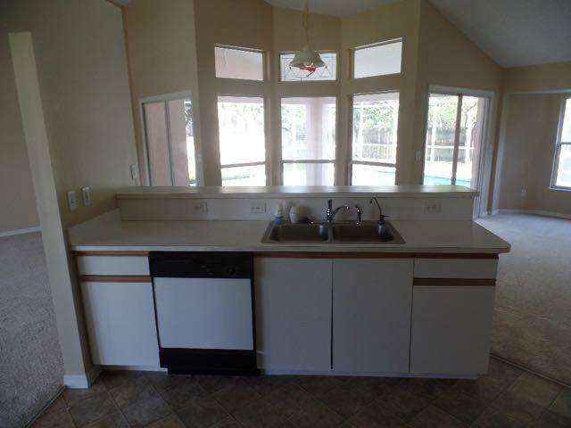 1234 Southwest Chase Road Port St. Lucie, FL 34953 - Photo 6 of 20 a close view of sink and mirror