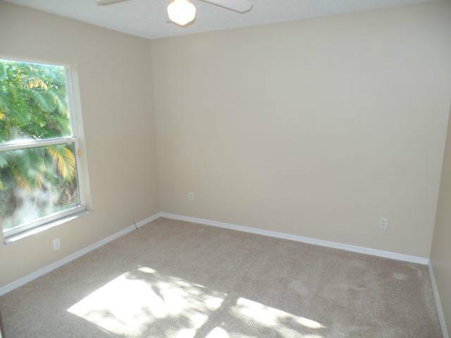 1234 Southwest Chase Road Port St. Lucie, FL 34953 - Photo 10 of 20 an empty room with a window