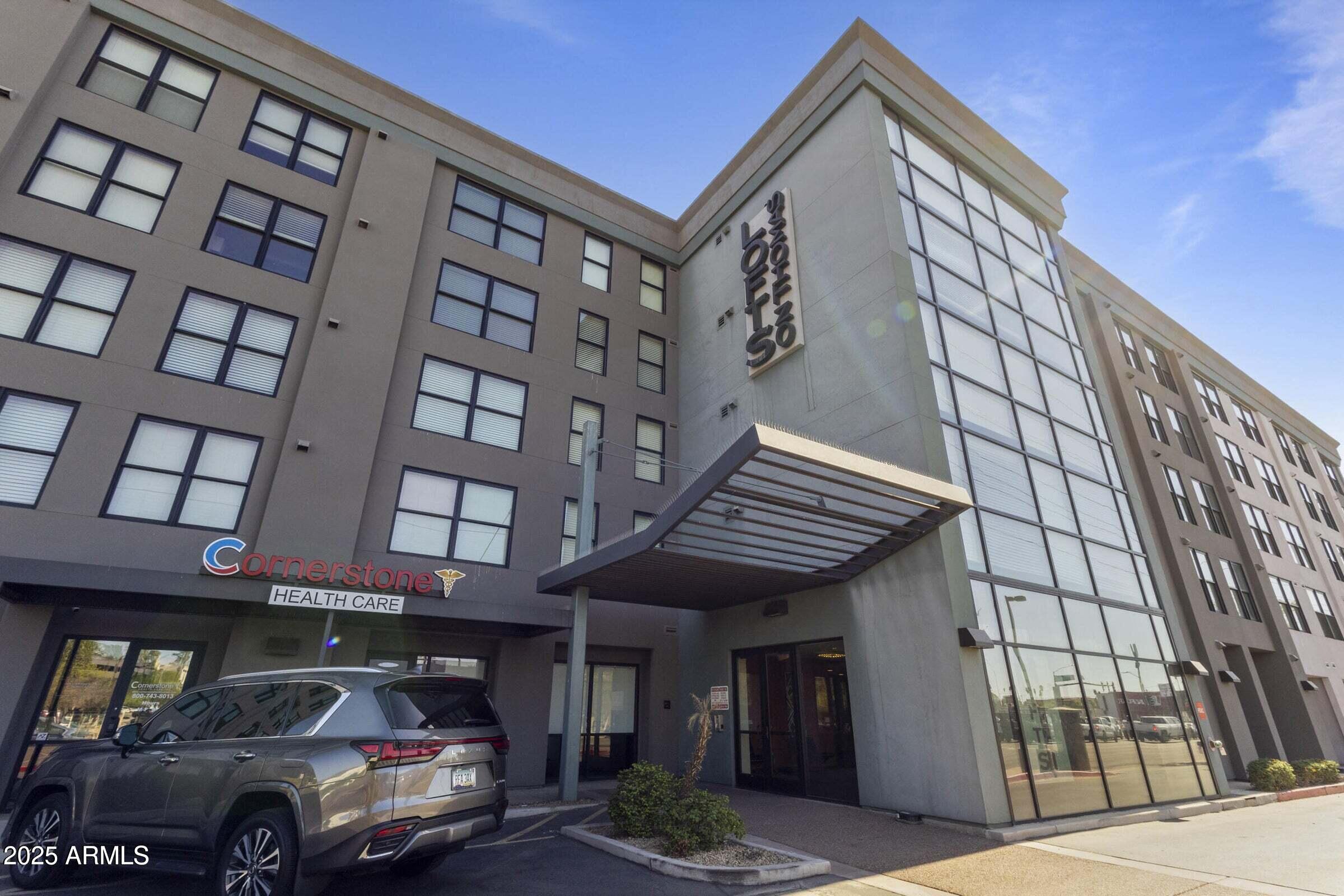 a car parked in front of a building