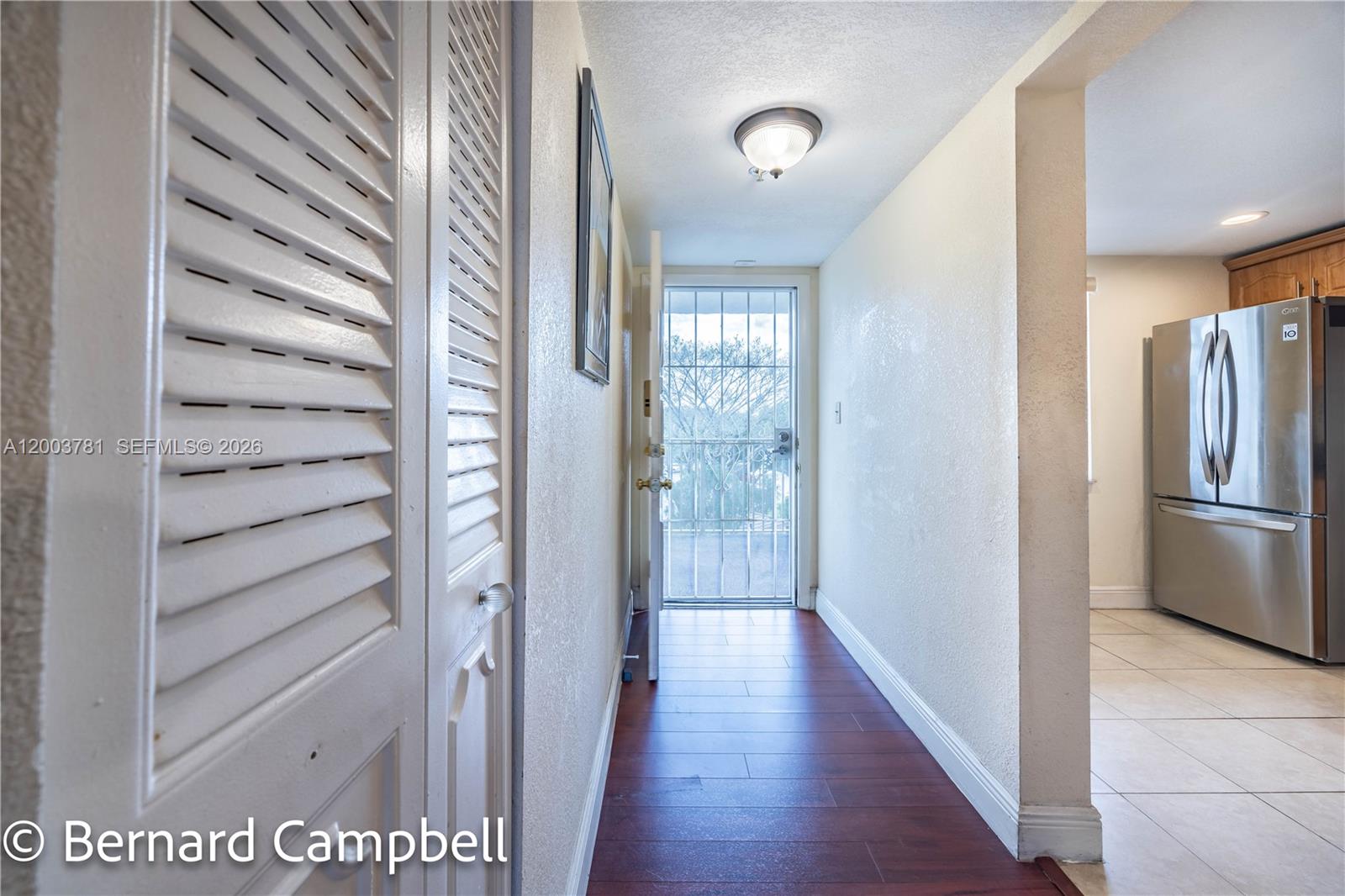 3940 Inverrary Boulevard, Unit 403A Lauderhill, FL 33319 - Photo 27 of 37 a view of a hallway with wooden floor