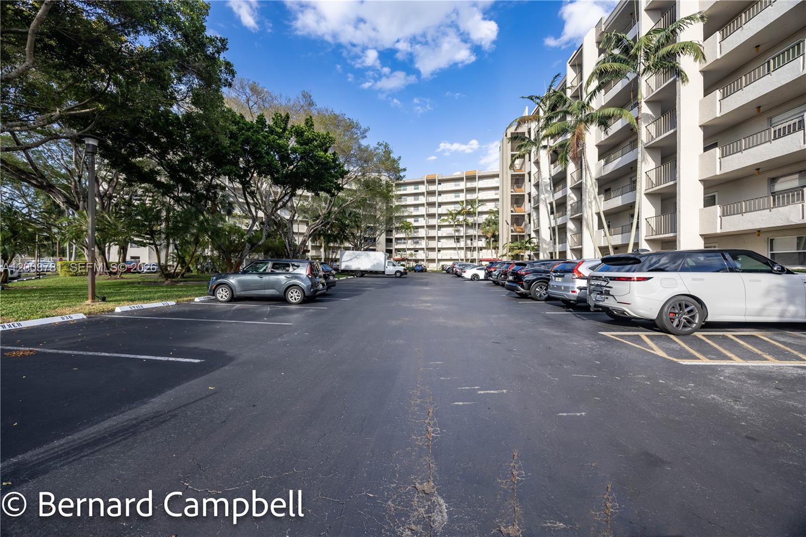 3940 Inverrary Boulevard, Unit 403A Lauderhill, FL 33319 - Photo 31 of 37 a car parked on the side of a street