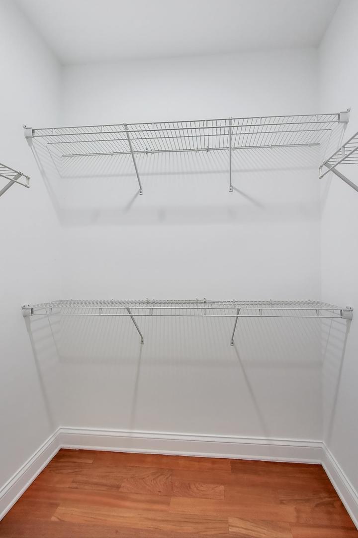 5058 North Kimball Avenue, Unit 4 Chicago, IL 60625 - Photo 15 of 26 a view of a room with racks on the wall