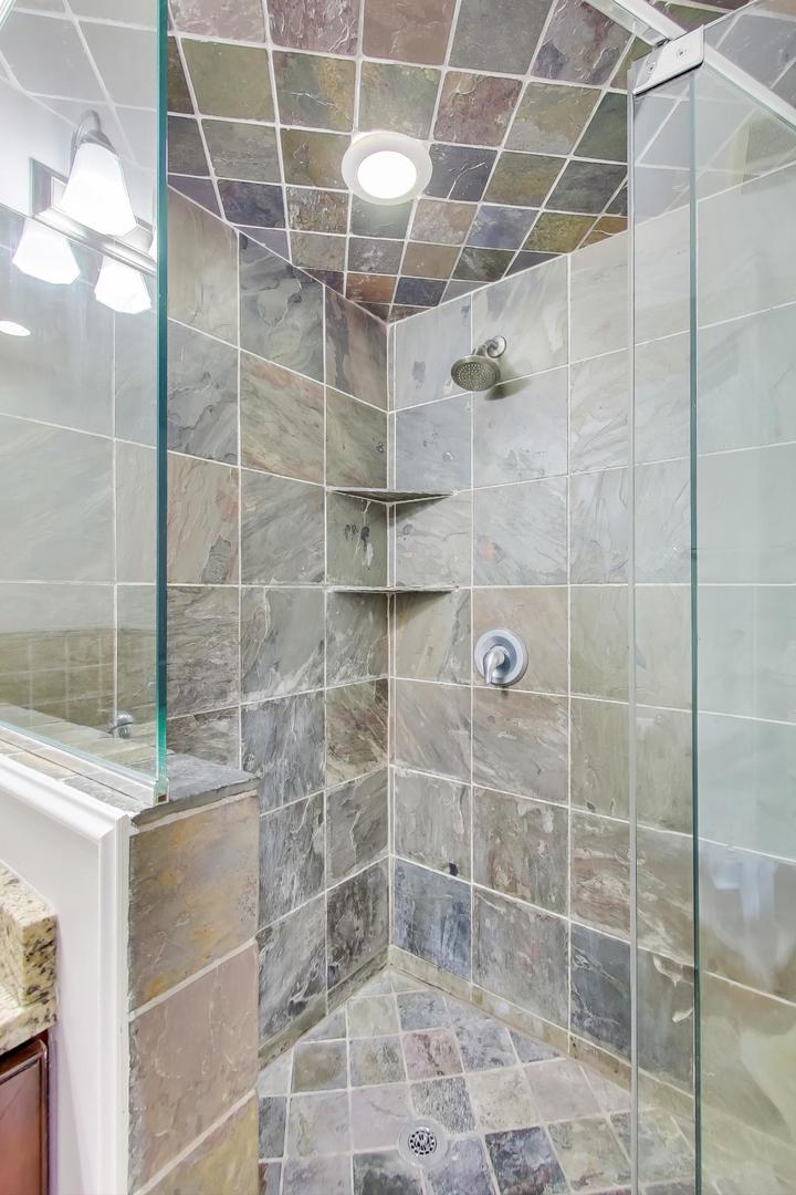 5058 North Kimball Avenue, Unit 4 Chicago, IL 60625 - Photo 18 of 26 a bathroom with a shower
