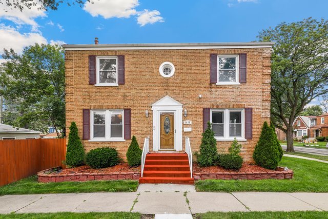 8458 South Constance Avenue Chicago, IL 60617 - Photo 1 of 23 front view of a house