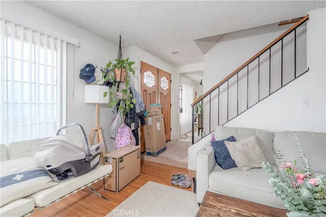 a living room with furniture and a table
