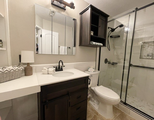 13506 Spring Court Tomball, TX 77375 - Photo 24 of 37 a bathroom with a sink toilet and shower