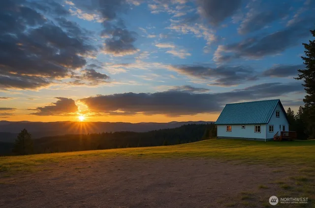 a view of an ocean & house