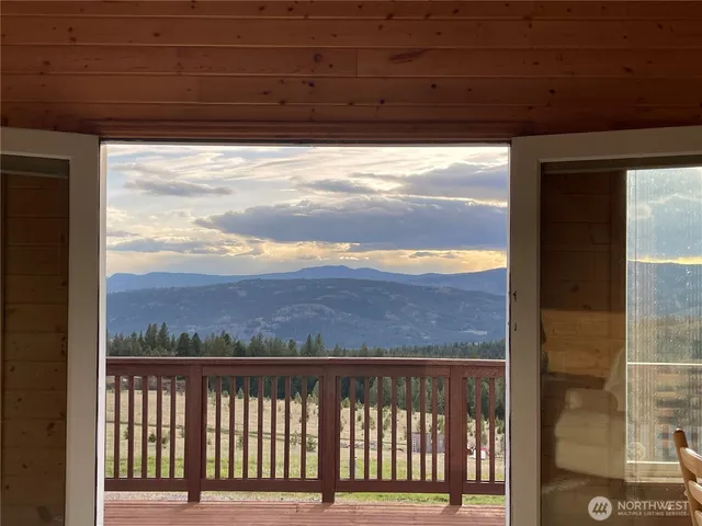 a view of a balcony with a ocean view