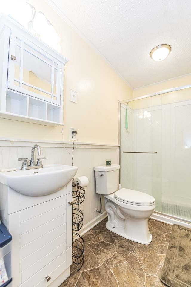 827 Sanford Road Covington, TN 38019 - Photo 15 of 25 a bathroom with a sink toilet and mirror