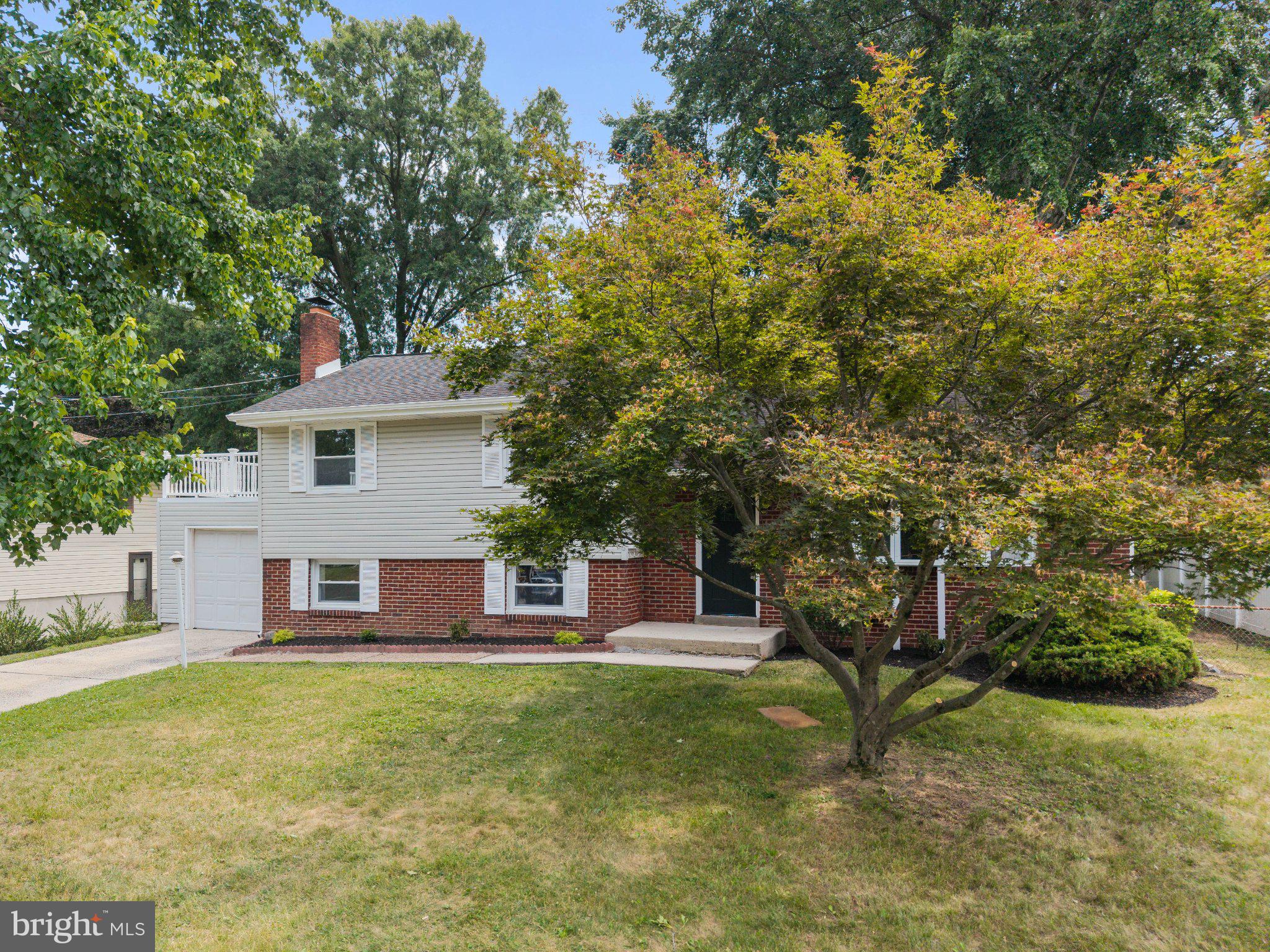 406 Yorkshire Road Cherry Hill, NJ 08034 - Photo 33 of 46 Charming home with lush greenery.