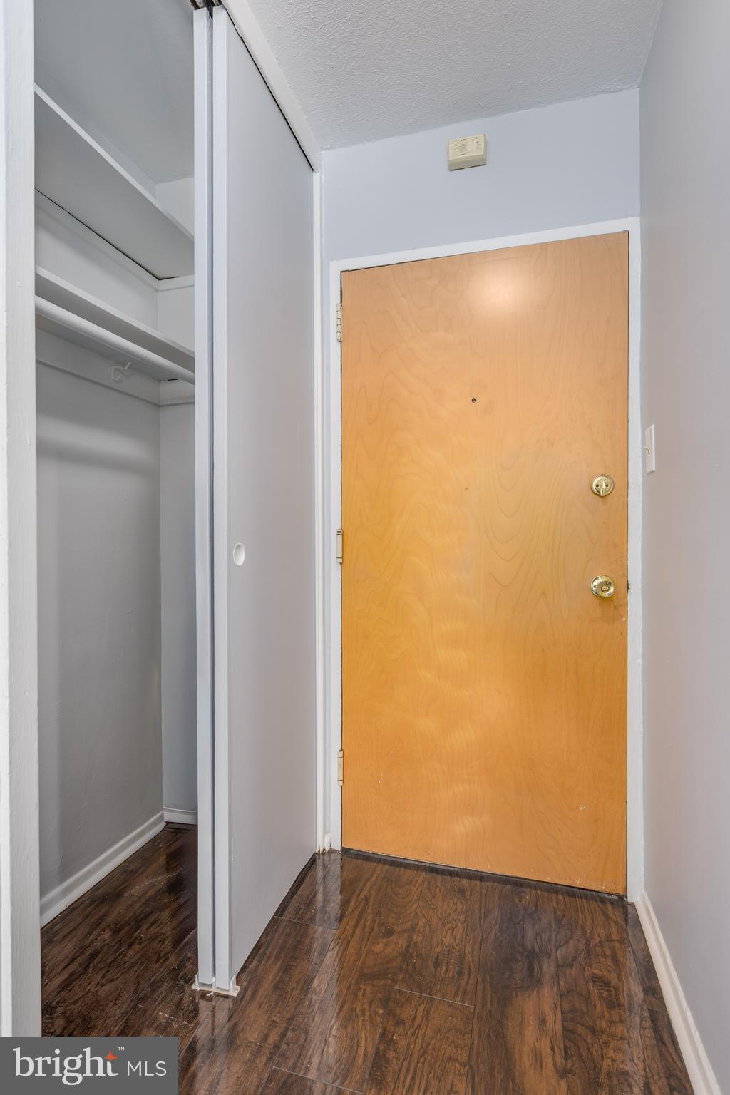 2101-17 Chestnut Street, Unit 705 Philadelphia, PA 19103 - Photo 4 of 10 a view of an empty room with wooden floor