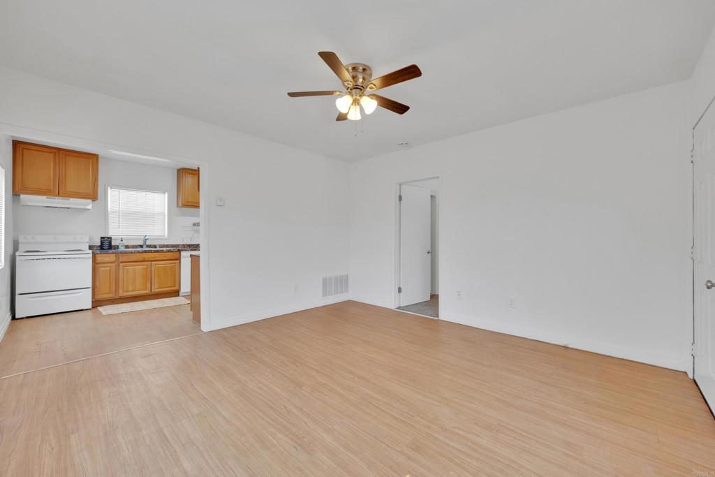 9015-9017 Campo Road Spring Valley, CA 91977 - Photo 33 of 60 a view of empty room with cabinet and ceiling fan